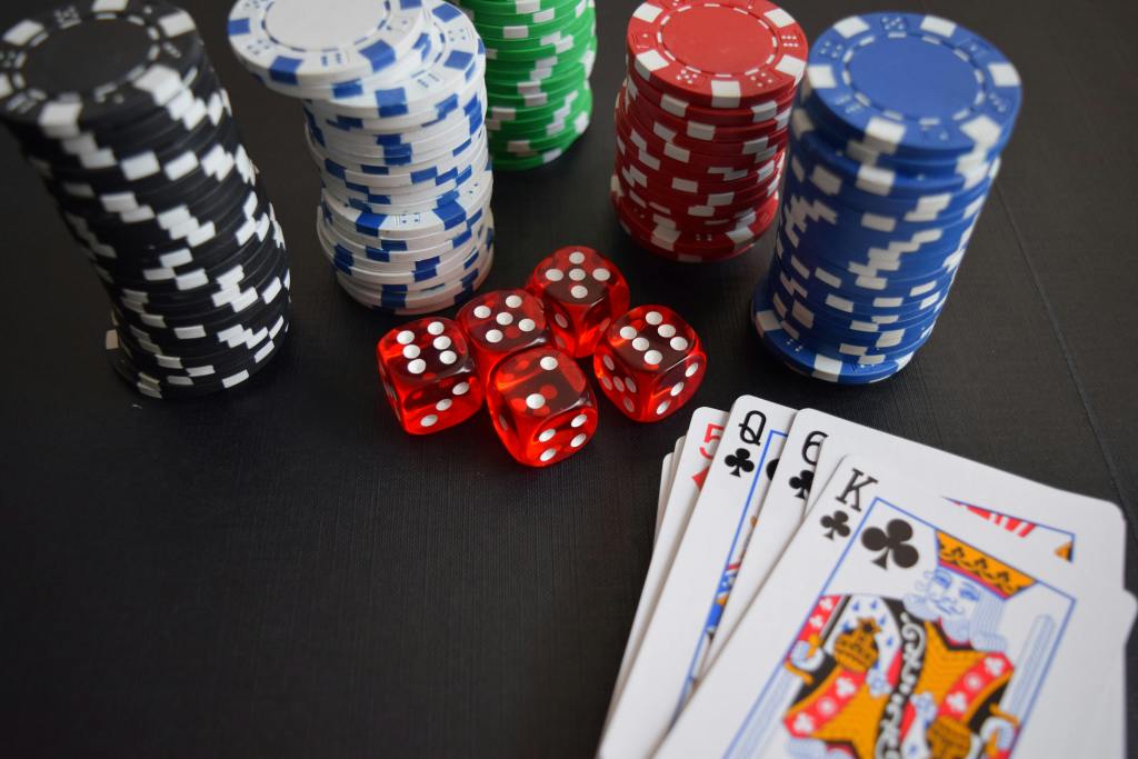 Poker chips, playing cards, and dice